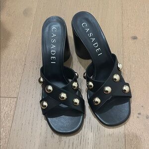 Casadei Black Mules with Gold Accents